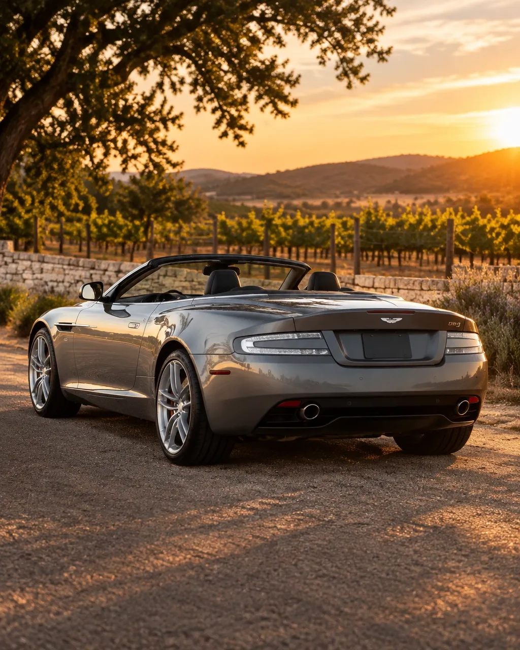 Rear three-quarter view of the silver-grey Aston Martin DB9 Volante